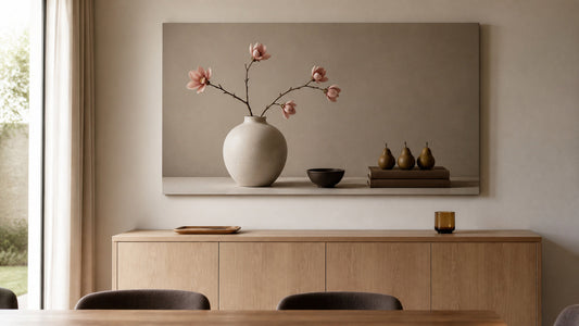 Conceptual dining-room illustration of printed still-life canvas with flowers, a vase and books; not an exact product for sale.
