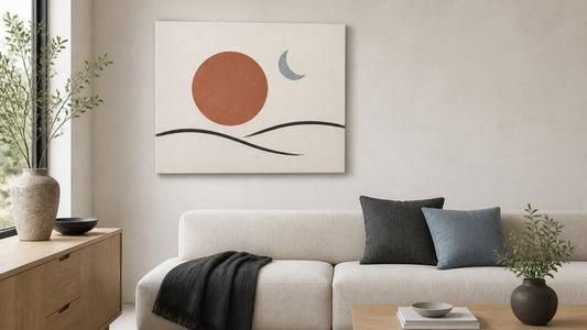 Sun and moon printed canvas with terracotta and blue-gray celestial shapes in a balanced modern living room